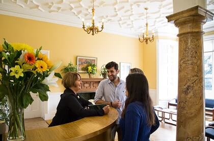 The reception area of the school with adult students